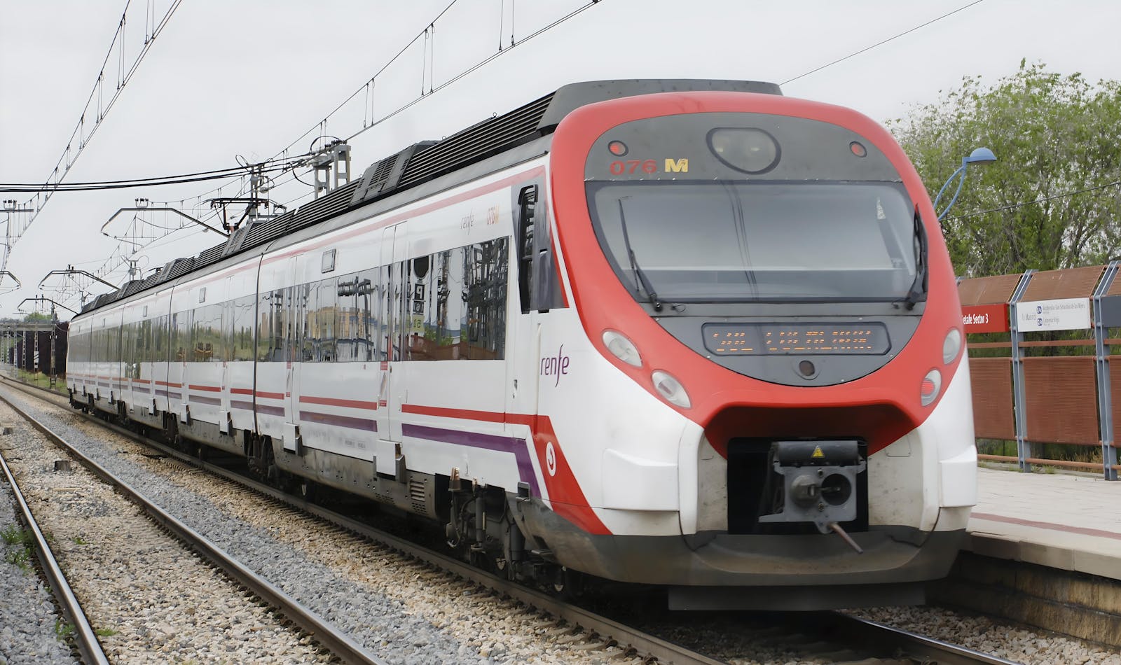 Sleek commuter train arriving at Madrid Cercanias station