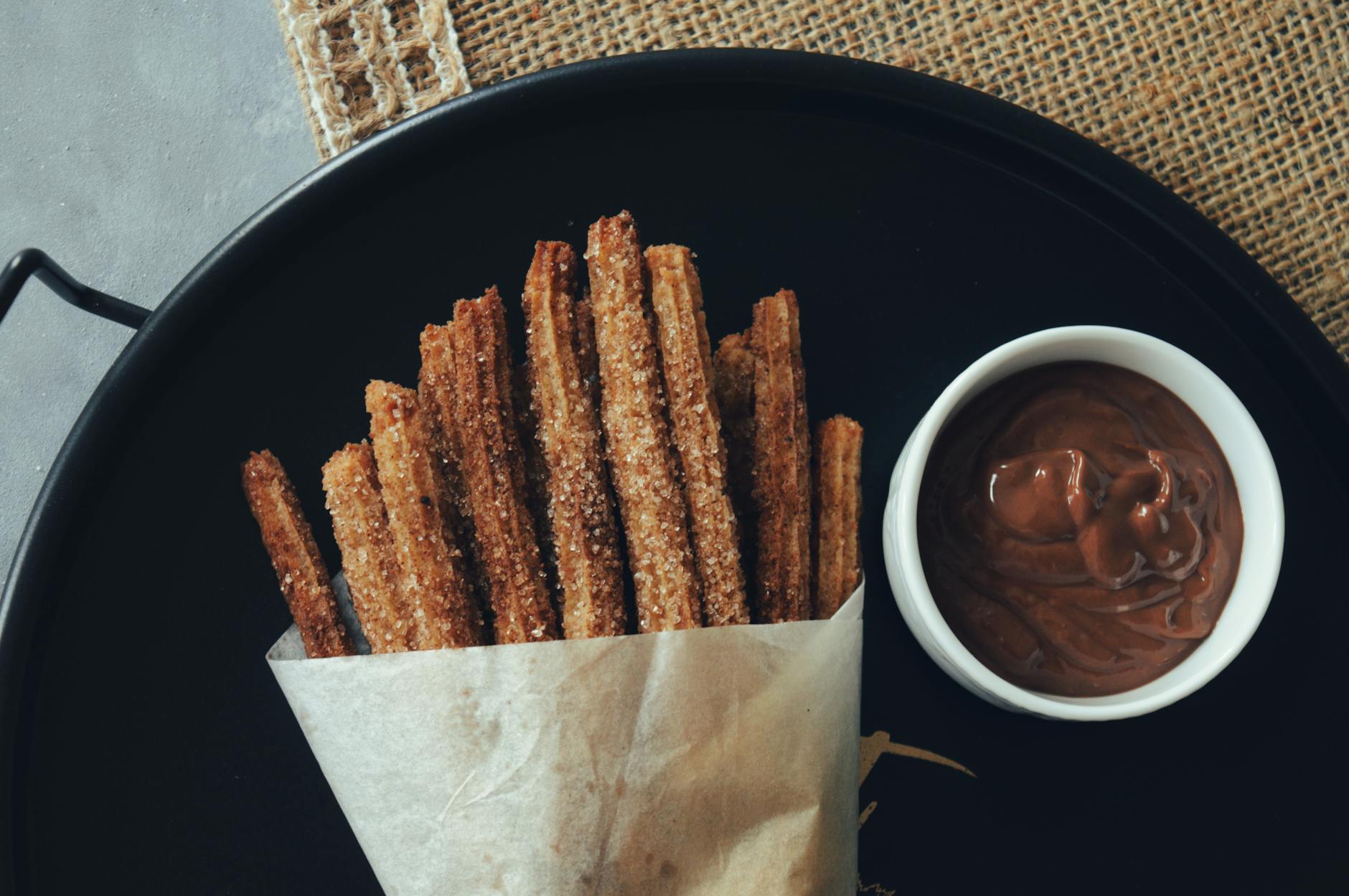 Churros with thick hot chocolate a traditional Madrid breakfast treat