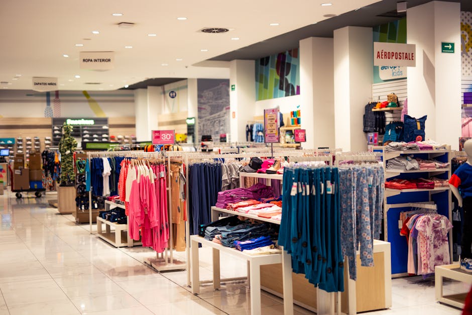 Interior of a modern department store with clothing displays