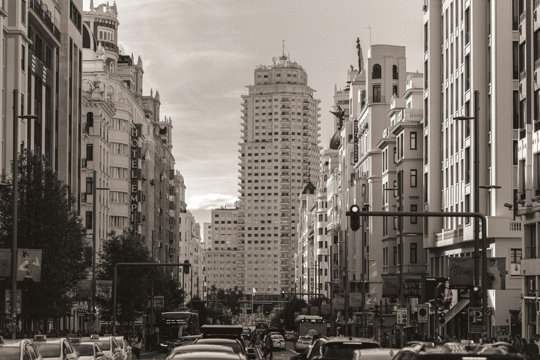 Gran Via Madrid busy street with traffic and pedestrians