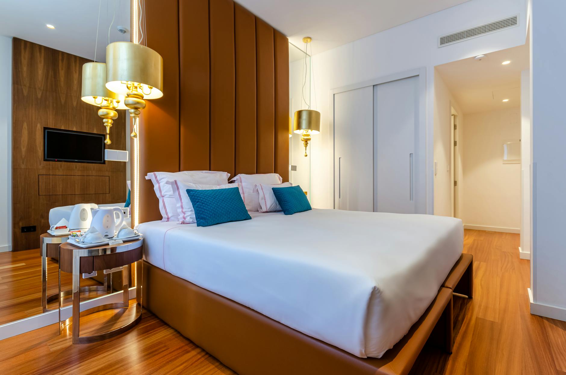 Where to Stay in Madrid: The Complete Neighborhood & Accommodation Guide 2 Luxury hotel room in Madrid with elegant furnishings