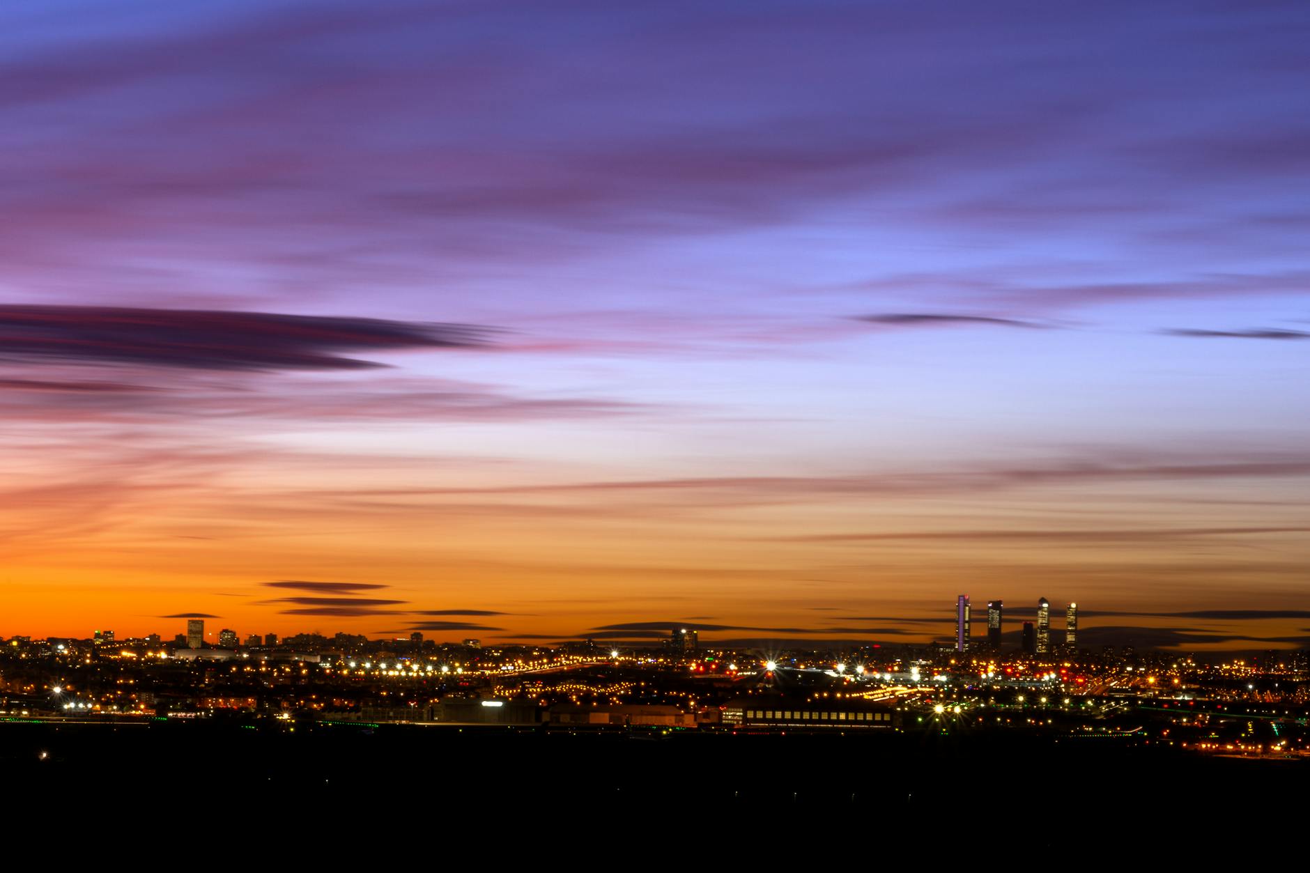 Madrid's stunning sunset skyline view from a rooftop