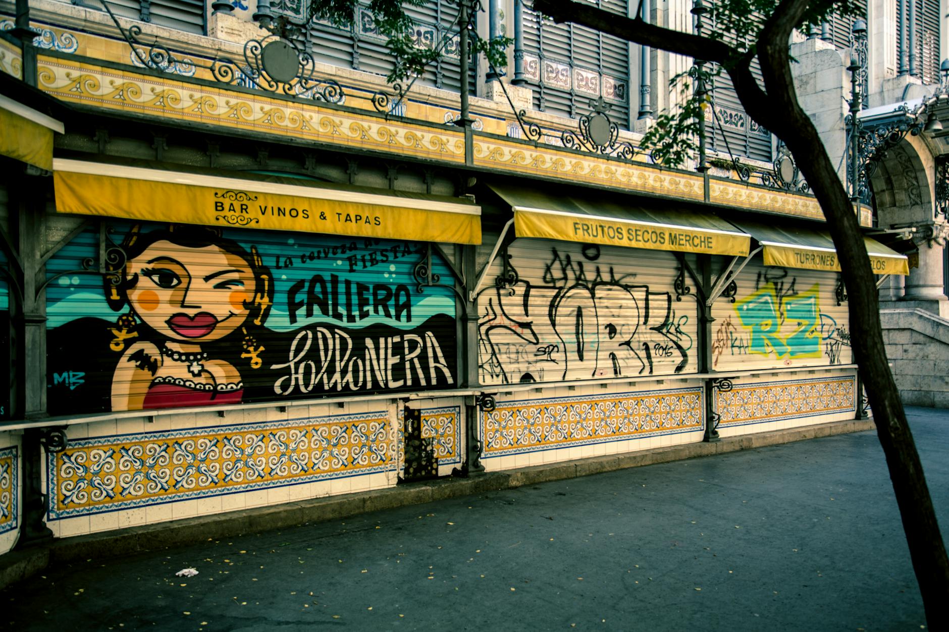Colorful bohemian street scene in Malasana neighborhood Madrid