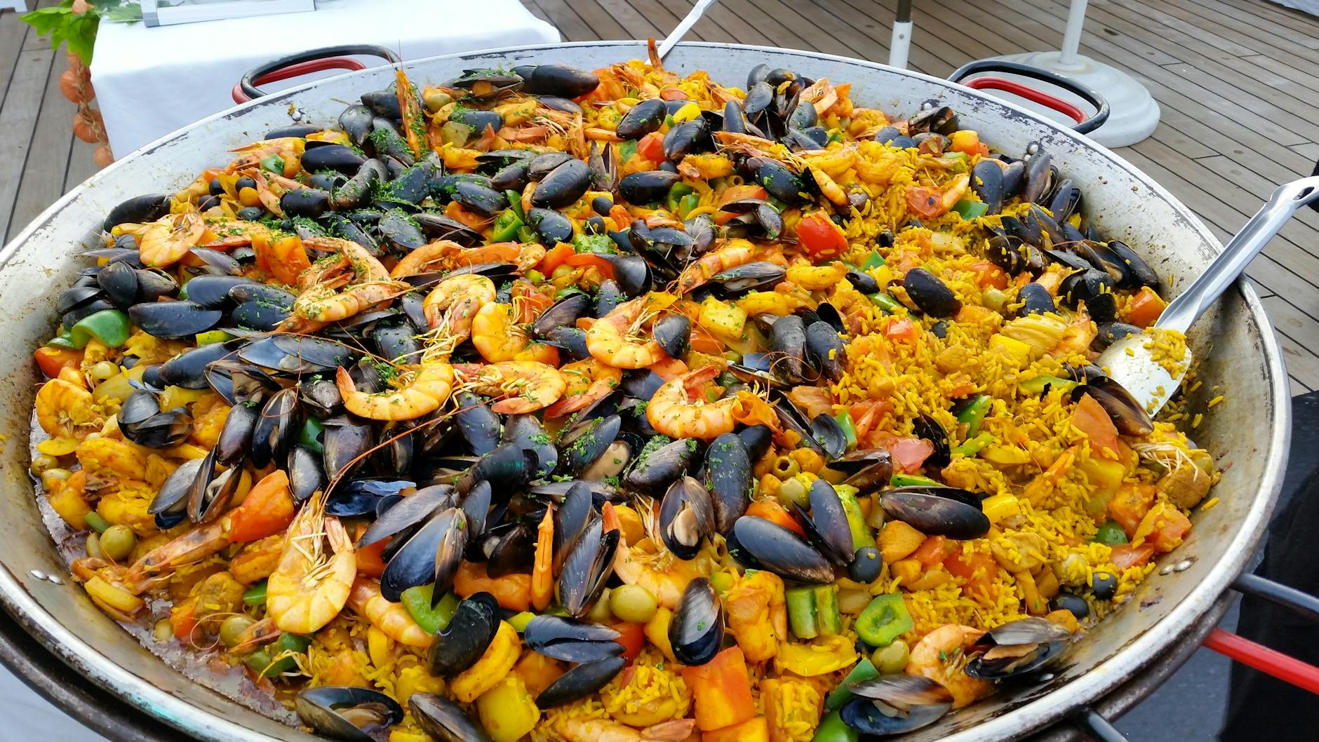 Traditional Spanish paella with seafood and saffron rice