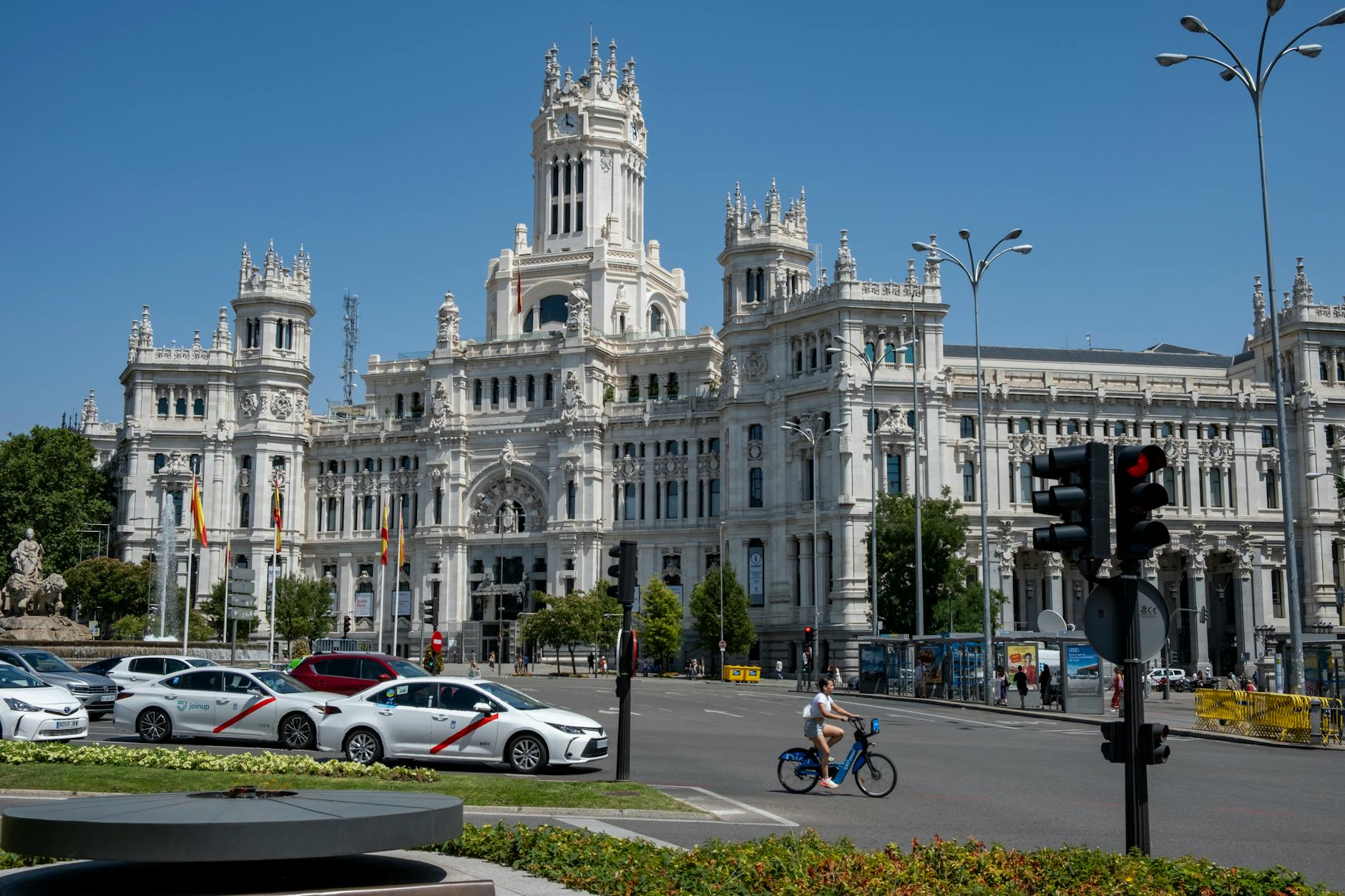 Cycling through Madrid green parks and urban bike paths
