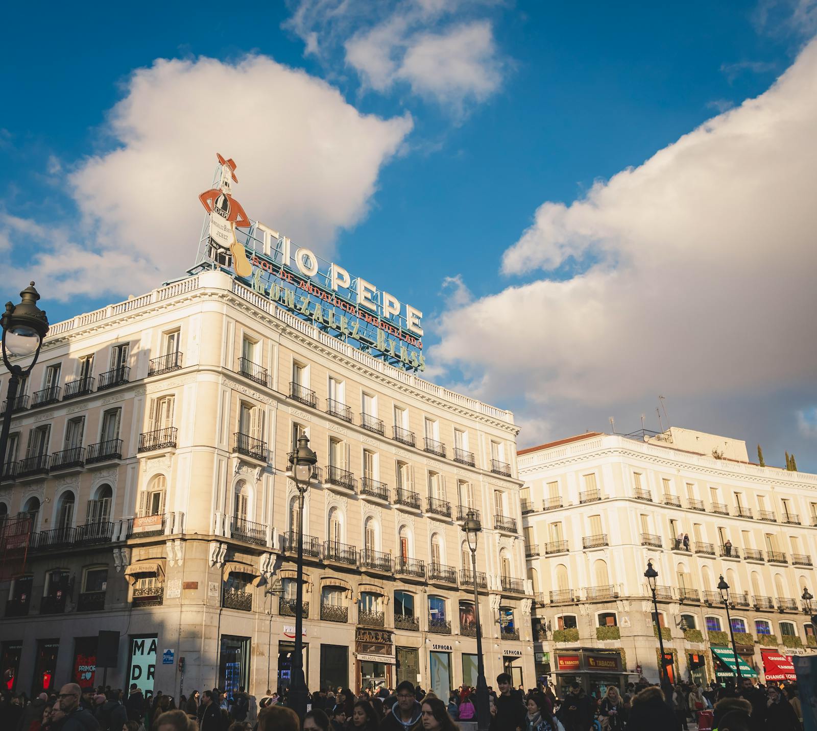 Puerta del Sol with Tio Pepe sign near Chueca neighborhood Madrid