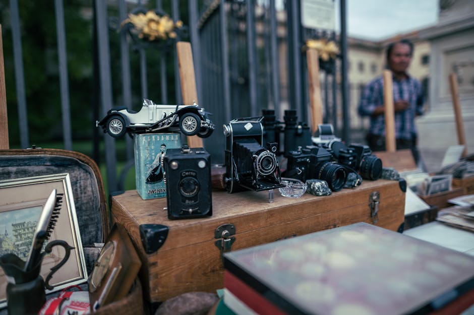 Vintage items displayed at an outdoor flea market