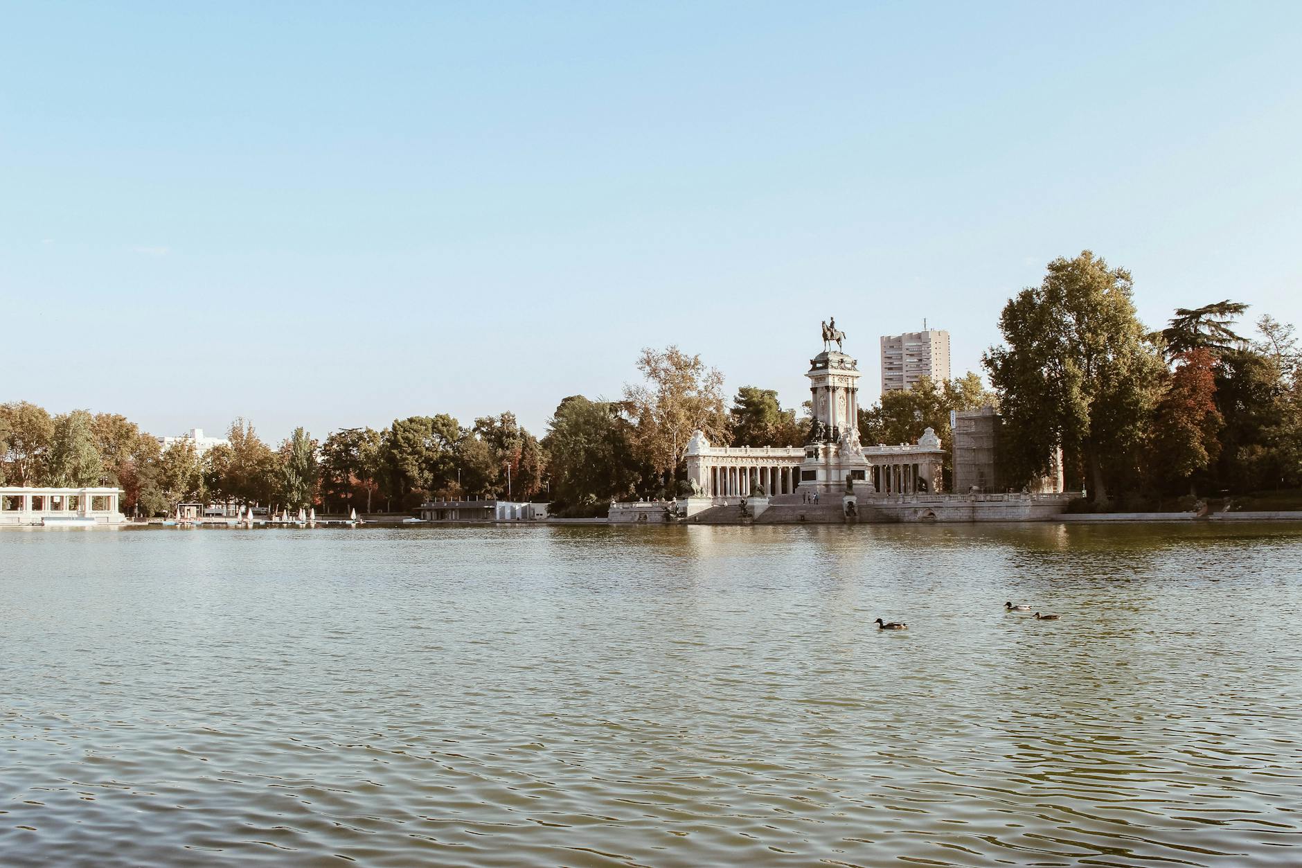 Where to Stay in Madrid: The Complete Neighborhood & Accommodation Guide 7 Retiro Park lake and Crystal Palace in Madrid