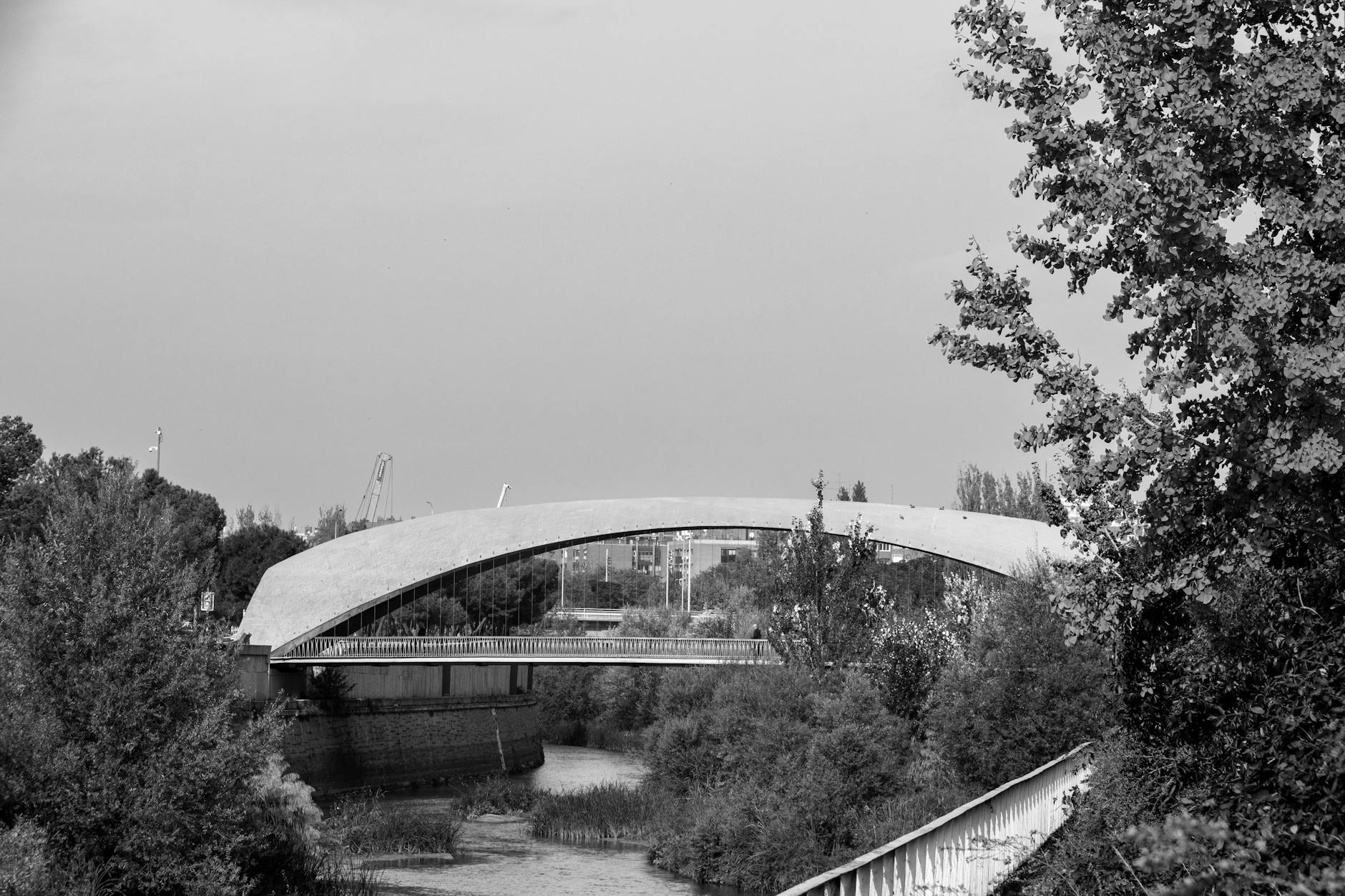 Madrid Rio park along the Manzanares River with modern bridges