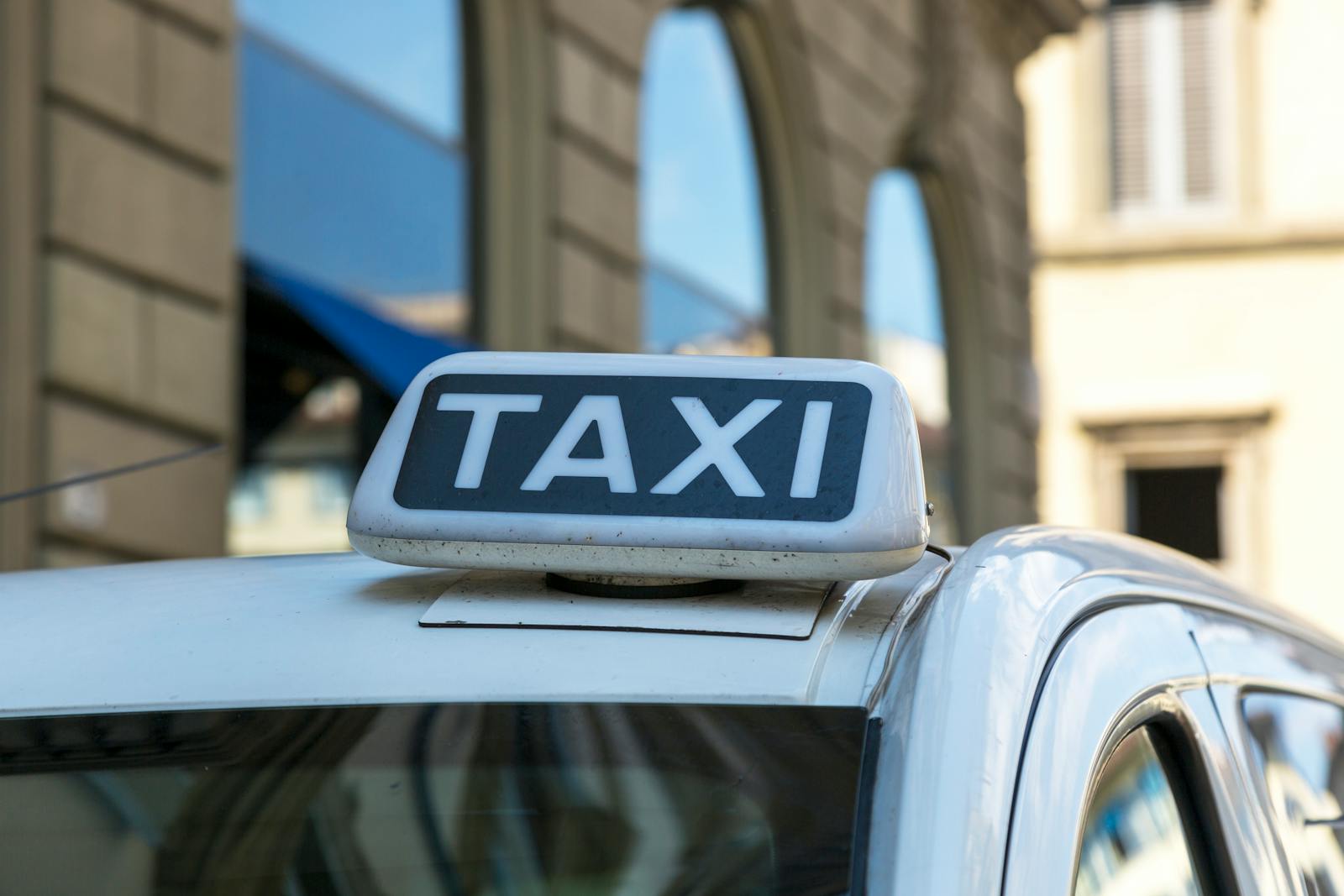 Close-up of a Madrid taxi roof sign on an urban street