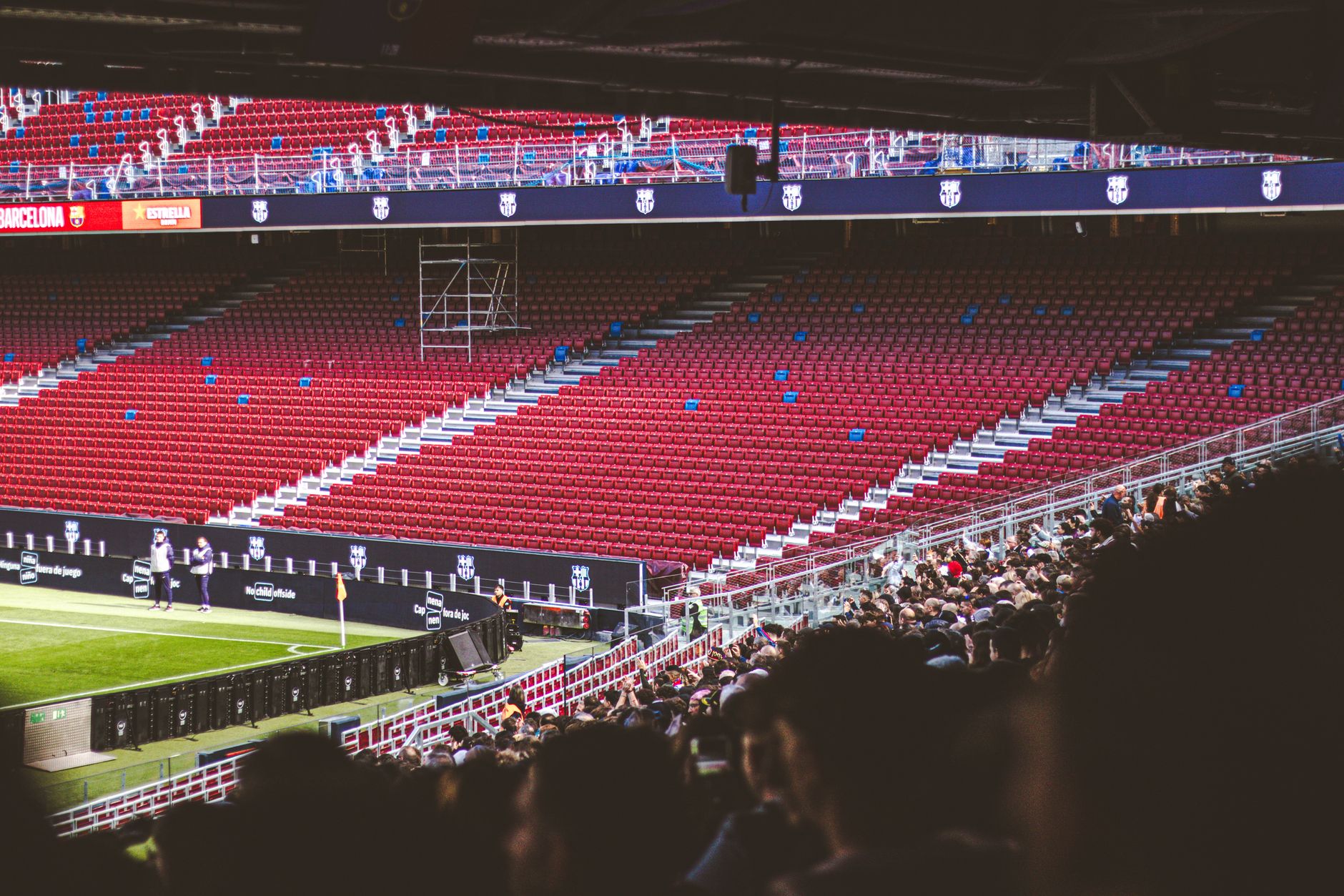 Real Madrid Stadium Tour Tickets: Complete Bernabéu Guide 2026 4 Inside a large football stadium showing the pitch and tiered seating from the lower stands