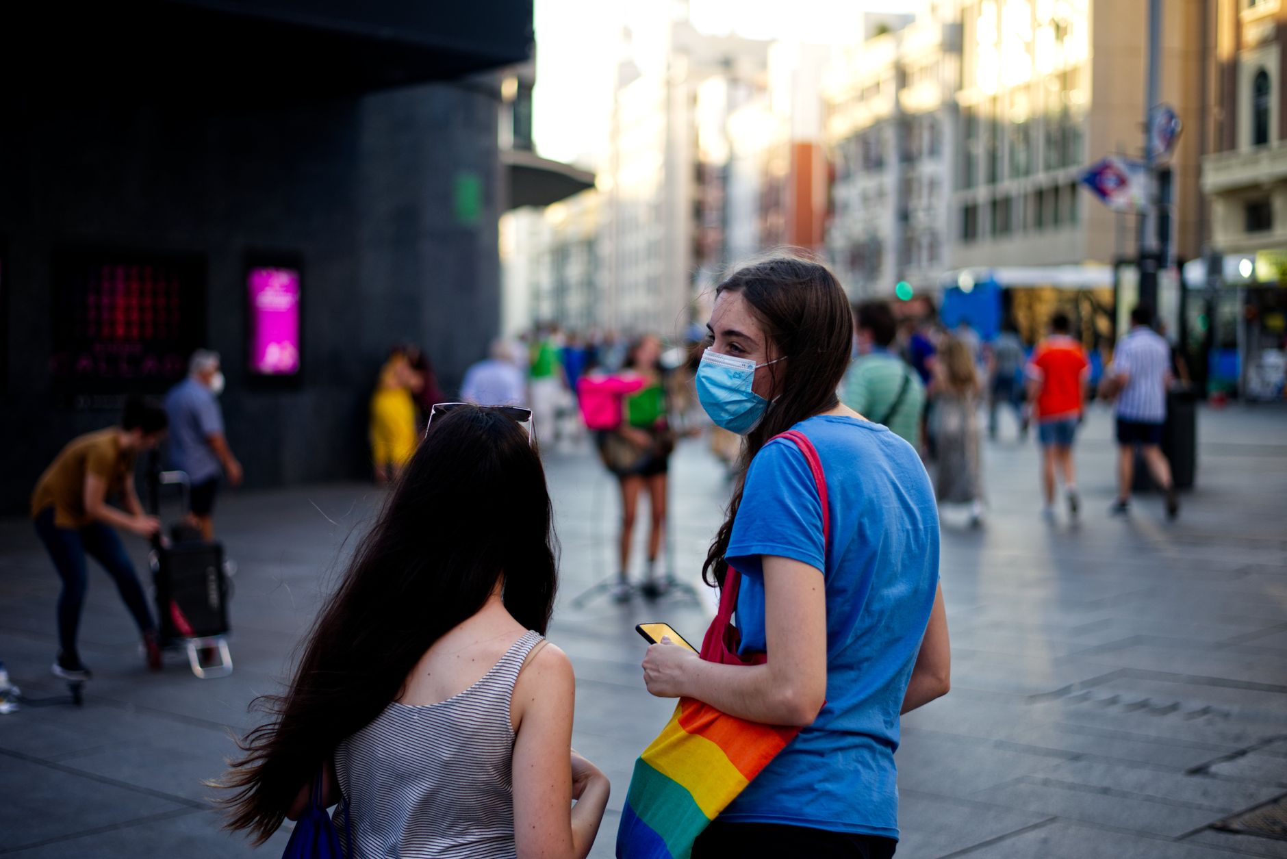 Staying in Chueca Madrid: Hotels and LGBTQ+ Guide 2026 4 Chueca Madrid street scene with rainbow pride decorations and colourful buildings