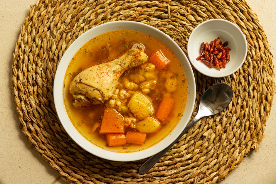 Cocido Madrileño Madrid: Best Restaurants and Recipe (2026) 4 Bowl of cocido madrileño with chickpeas, vegetables, and cured meats in Madrid