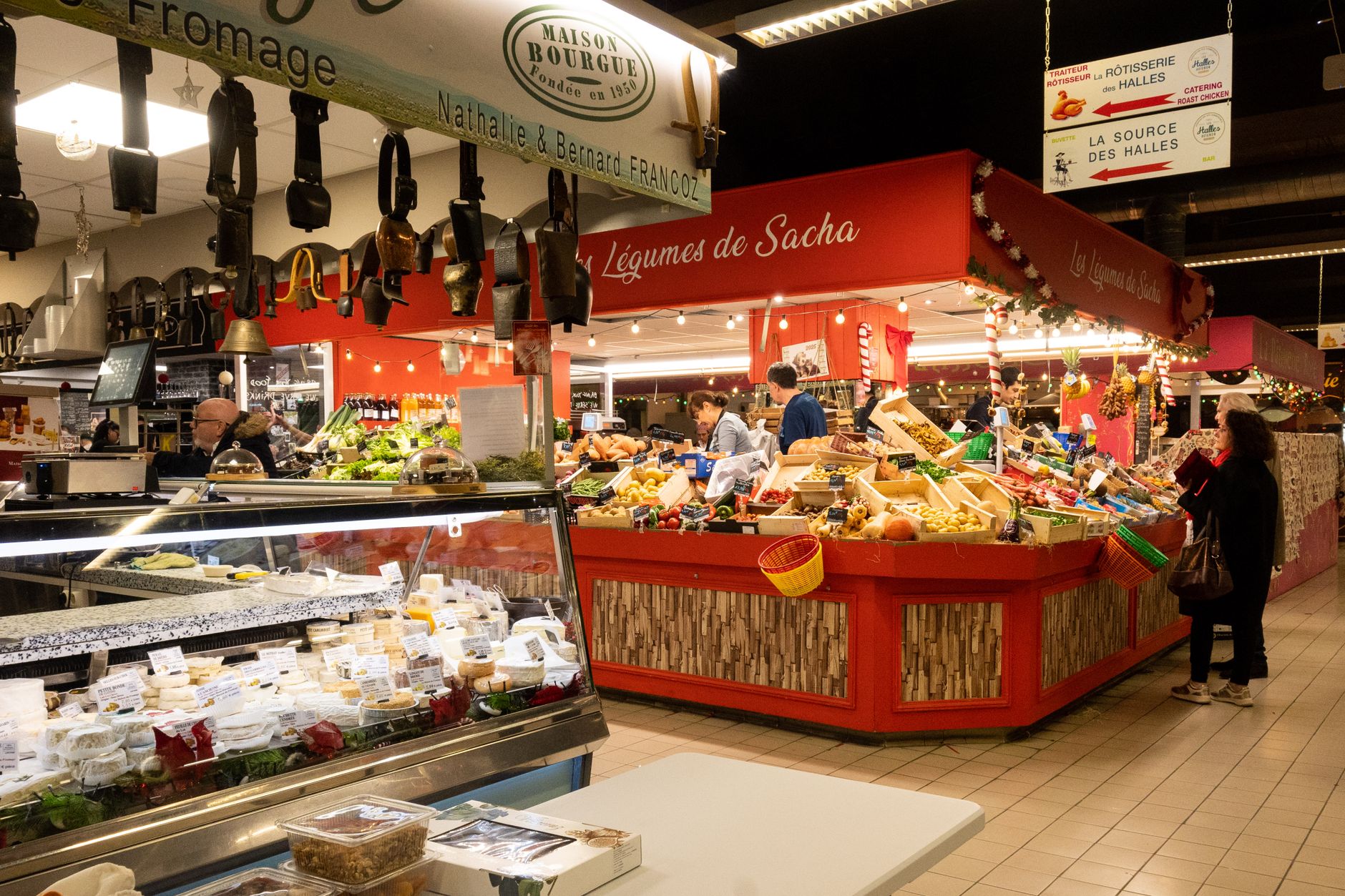 What to Do in Madrid When It Rains: 15 Best Indoor Ideas (2026) 3 Busy indoor food market with gourmet stalls under a glass and iron roof in Madrid