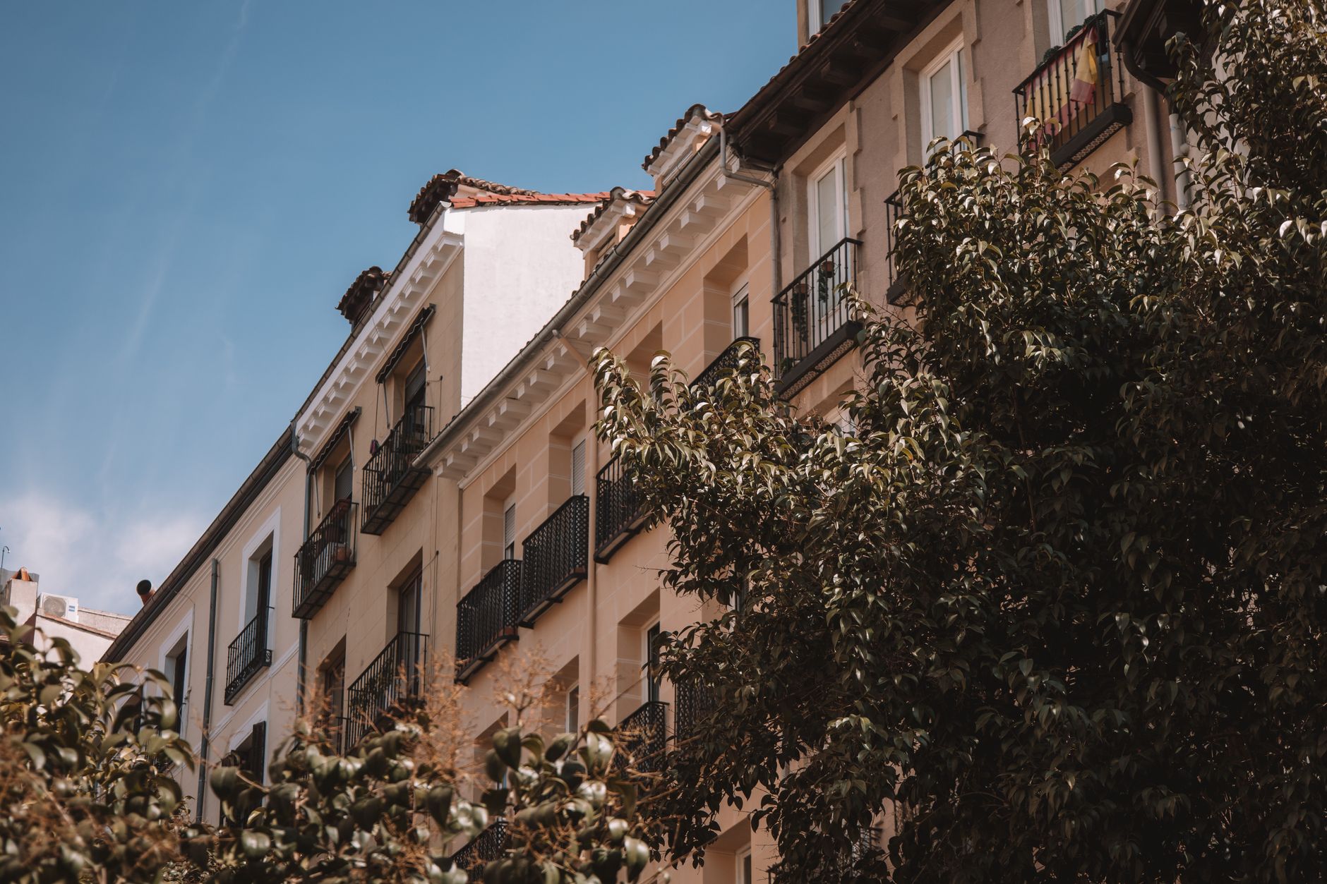 Airbnb Madrid: Top Apartment Picks & Tips 2026 4 Madrid street and plaza in residential neighborhood ideal for Airbnb apartments