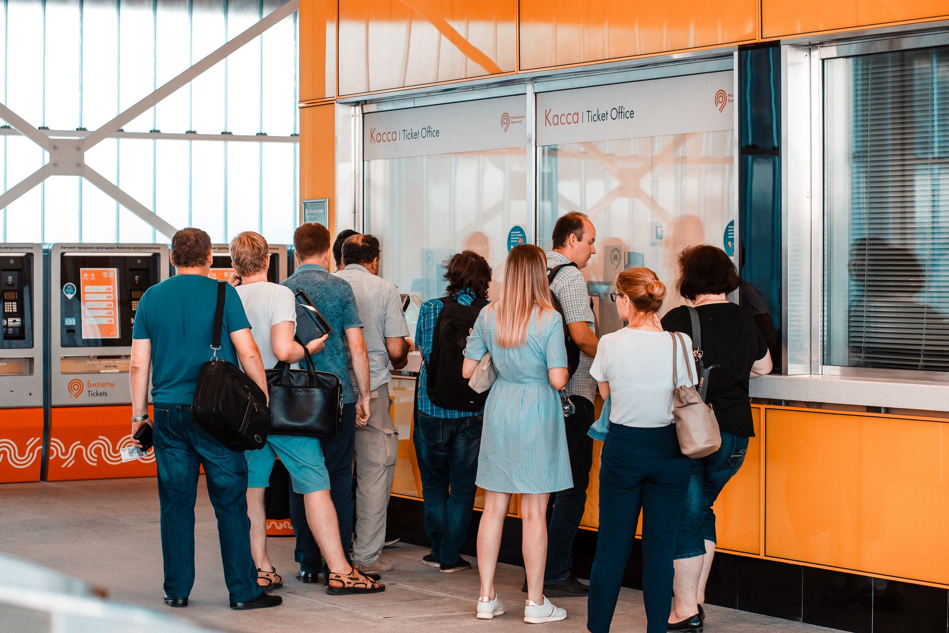 Madrid Museum Pass: Best Combined Tickets and Discounts 2026 4 Tourists queuing at a museum ticket office before entering