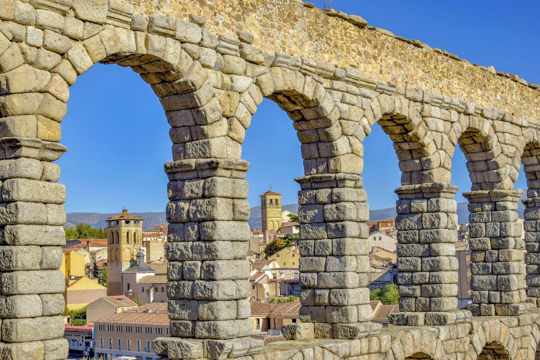 Segovia Day Trip from Madrid: Best Itinerary 2026 4 Segovia Roman aqueduct 166 arches above the city streets on a clear day